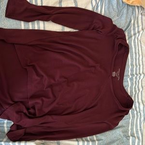 A purple of the shoulders sweater size medium